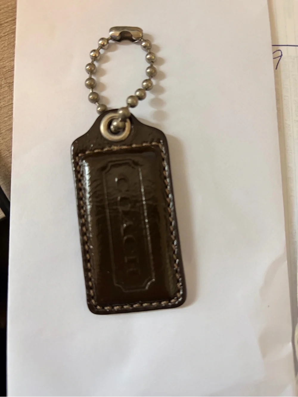 COACH Large 2.5” Dark Brown Patent Leather Hangtag Bag Charm